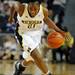 Michigan forward Nya Jordan drives down the court. Angela J. Cesere | AnnArbor.com