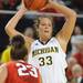 Ohio State forward Martina Ellerbe, left, guards Michigan guard Carmen Reynolds as she looks for a pass. Angela J. Cesere | AnnArbor.com