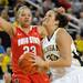 Michigan guard Carmen Reynolds, right, drives pas Ohio State forward Martina Ellerbe to take a shot. Angela J. Cesere | AnnArbor.com