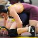 Dexter's Drew Barnes, top, tries to pin Gaylord's Hunter Warden durin gthe 160 lb weight class match.  Angela J. Cesere