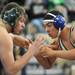 Skyline's Chris Ash tries to gain the advantage of Lumen Christi's Connor Kirkpatrick during the 189 lb weight class match. Angela J. Cesere