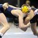 Chelsea's Steve Bleise, left, tries to gain the advantage of St. Johns' Logan Massa during the 119 lb weight class quarter final match at the Palace of Auburn Hills during the MHSAA individual wrestling finals. Angela J. Cesere | AnnArbor.com
