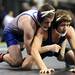 Ypsilanti Lincoln's Ed Nuttall, left, tries to keep down Carman Ainsworth's Jake Weissend during the Div. 1, 145 lb weight class match at the Palace of Auburn Hills during the MHSAA individual wrestling finals. Angela J. Cesere | AnnArbor.com
