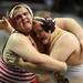 Dexter's Shawn Chamberlain, right, tries to gain the advantage of Stevensville Lakeshore's Kyle Carlson during the Div. 2, 285 lb weight class match at the MHSAA individual wrestling finals at the Palace of Auburn Hills. Angela J. Cesere | AnnArbor.com