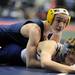 Chelsea's Steve Bleise top, tries to pin North Branch's Ryan Garza during the Div. 2, 119 lb weight class match during the MHSAA individual wrestling finals at the Palace of Auburn Hills. Angela J. Cesere | AnnArbor.com