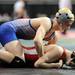 Ypsilanti Lincoln's Jordan Markey, top, tries to keep down Temperance-Bedford's Mitch Pawlak during the Div. 1, 119 lb weight class match during the MHSAA individual wrestling finals at the Palace of Auburn Hills. Angela J. Cesere | AnnArbor.com