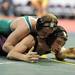 Manchester's Tom Conway bottom, tries to escape from Leroy Pine River Area's Abel Langworthy during the Div. 4, 130 lb weight class match at the MHSAA individual wrestling finals at the Palace of Auburn Hills. Angela J. Cesere | AnnArbor.com