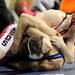 Milan's Chris Gaskill top, tries to pin New Boston Huron's Marcus Copley during the Div. 2, 160 lb weight class match during the MHSAA individual wrestling finals at the Palace of Auburn Hills. Angela J. Cesere | AnnArbor.com