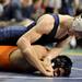 Chelsea's Mike Hovater, tries to pin Byron Center's Zack Gnass during the Div. 2, 171 lb weight class match at the MHSAA individual wrestling finals at the Palace of Auburn Hills. Angela J. Cesere | AnnArbor.com