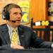Michigan athletic director David Brandon talks on the radio at the M-Den during the WTKA Mott Takeover fundraising event.  Angela J. Cesere | AnnArbor.com