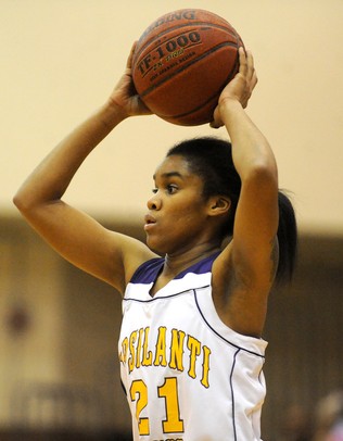 Ypsilanti's NyRee Watson looks for a pass. Angela J. Cesere