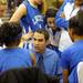 Ypsilanti Lincoln's head coach Mike Hotchkiss talks to his team at the end of the first quarter. Angela J. Cesere