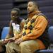 Ypsilanti head coach Chris Slater, right, talks with Chasidy Chambers. Angela J. Cesere