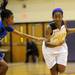 Ypsilanti Lincoln's Arielle Cagor, left, tries to block Ypsilanti's Jasmine Jones as she dribbles down the court. Angela J. Cesere