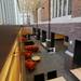 A wall of windows lets natural light flood in to a new two-story atrium at the University of Michigan's newly renovated East Quad dormitory. Melanie Maxwell | AnnArbor.com