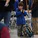 Ambrose Kelley, 6, plays on an iPod as he holds a spot in line for his mom so she can vote at Forsythe Middle School on Tuesday morning. Melanie Maxwell I AnnArbor.com