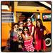 Kids pose in front of the "Digital Bus" a fully-restored 1972 VW bus owned by Derek Mehraban during Tech Twilight 2012 held at the Ann Arbor Hands on Museum. (derekmehraban)