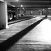 Shadows extend through a downtown parking garage. (idafey)