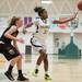Huron's Payton Sims passes the ball during the second half of their game against Dexter, Tuesday Feb. 5th.
Courtney Sacco I AnnArbor.com 