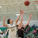 Huron's Bianca Williams and Dexter's Riley McDonald jump as they try to make a rebound during the forth quarter, Tuesday Feb. 5th.
Courtney Sacco I AnnArbor.com 