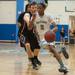 Skyline's Isaac Lockhart dribbles the ball down court against Dexter during the second half of their game Tuesday Feb. 12. 
Courtney Sacco I AnnArbor.com 