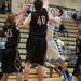 Skyline's Ian Marshall jumps to make a shot against Dexter during the second half of their game Tuesday Feb. 12th. 
Courtney Sacco I AnnArbor.com 