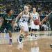 Wolverines Jenny Ryan dribbles the ball past Spartans Jasmine Thomas during the second half of their game Saturday Feb. 16th.
Courtney Sacco I AnnArbor.com 