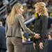 Wolverines head coach Kim Barnes Arico speaks with Spartans head coach Suzy Merchant before the start of their game Saturday Feb. 16th.
Courtney Sacco I AnnArbor.com  