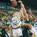 Wolverines Nicole Nelmblad jumps for a rebound during the second half of their game Saturday Feb. 16th.
Courtney Sacco I AnnArbor.com 