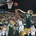 Wolverines Nya Jordan jumps to make a shot against Spartans Annalise Pickrel during the second half of their game Saturday Feb. 16th.
Courtney Sacco I AnnArbor.com