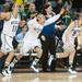 Wolverines rush the court as they win 70-69 against the Spartans. 
Courtney Sacco I AnnAarbor.com 