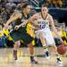 Wolverines Kate Thompson dribbles the ball down the court past Spartans Klarissa Bell during the first half of their game Saturday Feb. 16th.
Courtney Sacco I AnnArbor.com  