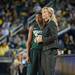 Spartans head coach Suzy Merchant talks to Kiana Johnson during a free throw. 
Courtney Sacco I AnnArbor.com  