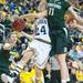 Wolverines Jenny Ryan jumps to make a shot but is fouled by Spartans Annalise Pickrel during the first half of their game Saturday Feb. 16th.
Courtney Sacco I AnnArbor.com    
