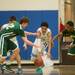 Skyline's Tristan Wilson along with Huron's Nasheed Bass and James Bernard dive after a loos ball during the second half of their game Tuesday night.
Courtney Sacco I AnnArbor.com 