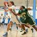 Skyline's Chris Spaly drives the ball against Huron's Nasheed Bass during Tuesday nights game.
Courtney Sacco I AnnArbor.com 
