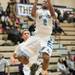 Skyline's Isaac Lockhart jumps as he makes a basket during the sound half of their game against Huron Tuesday night.
Courtney Sacco I AnnArbor.com