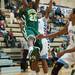 Huron's Demetrius Sims jumps to make a rebound during the first half of their game against Skyline Tuesday night.
Courtney Sacco i AnnArbor.com 