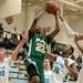 Huron's Xavier Cochran jumps to make a basket during the first half of their game against Skyline Tuesday night.
Courtney Sacco i AnnArbor.com 