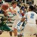 Skyline's Chris Spaly makes a rebound during the first half of their game against Huron Tuesday night.
Courtney Sacco i AnnArbor.com 