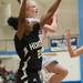 Skyline's Anita Vandermeulen jumps to make a shot against Huron's Alexis Garner during the first half of Tuesday nights game.
Courtney Sacco I AnnArbor.com  