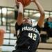 Huron's Micah Robinson jumps as she shoots a basket during the second half of their game at Skyline High School Tuesday night.
Courtney Sacco I AnnArbor.com  