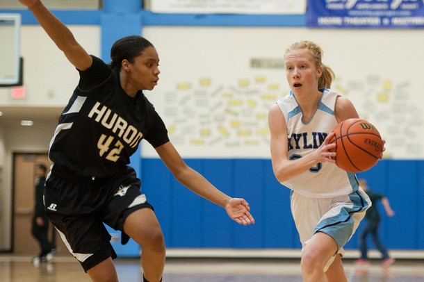 Skyline's Anita Vandermeulen dribbles the ball down court against Huron's Micah Robinson during the first quarter of Tuesday nights game.
Courtney Sacco I AnnArbor.com  