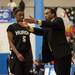 Huron's Head Coach Steve Vincent talks to Cydney Hardy after a bad play. 
Courtney Sacco I AnnArbor.com 