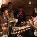 A Vinology bartender explains the Pear-Stachio Martini to Christy Perros during the Ann Arbor Art Center's Artini Martini Crawl Friday Feb. 22.
Courtney Sacco I AnnArbor.com 