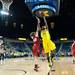 Wolverines Nya Jordan jumps to make a basket against Cornhuskers Lindsey Moore during the first half of their game Thursday night.
Courtney Sacco I AnnArbor.com 