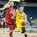 Wolverines Rachel Sheffer drives the ball past Cornhuskers Jordan Hooper during the second half of their game Thursday night.
Courtney Sacco I AnnArbor.com    