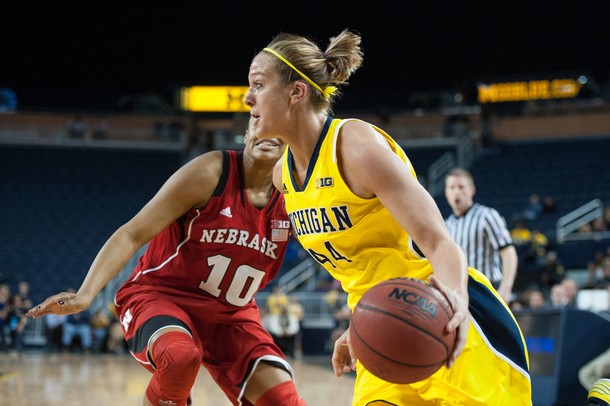Wolverines Rachel Sheffer dribbles the ball past Cornhuskers Meghin Williams  during the first half of their game Thursday night.
Courtney Sacco I AnnArbor.com 