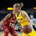 Wolverines Rachel Sheffer dribbles the ball past Cornhuskers Meghin Williams  during the first half of their game Thursday night.
Courtney Sacco I AnnArbor.com 