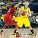 Wolverines Jenny Ryan looks for an open team mate as she is guarded by Cornhuskers Tear'a Laudermill during the first half of their game Thursday night.
Courtney Sacco I AnnArbor.com 